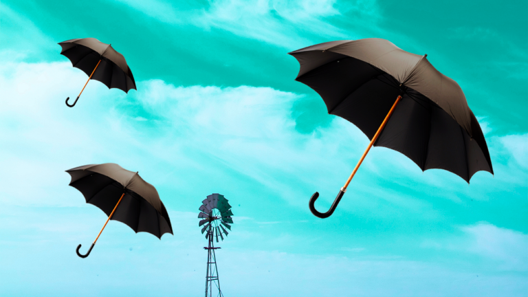 imagem capa blog com guarda-chuvas voando sob o céu azul representando a produtividade impactada pelas dívidas